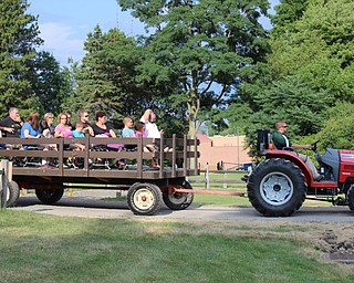 Neighbors | Abby Slanker.Families were able to enjoy a wagon ride around Boardman Park during the park’s Family Night in the Park on July 16.