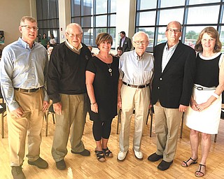 SPECIAL TO THE VINDICATOR | At a recent meeting of the YMCA of Youngstown, awards were presented to volunteers in four categories of service. Each of the awards is named in honor of an individual that has served the Y and has been instrumental in promoting its mission and include Dick Bennett, former chief executive officer; Howard B. “Howdy” Friend, board member; the late James B. Greene, board member; and the late Joe Check, staff member. Denise Stewart, an instructor at the Kent State University Police Academy and YMCA board member, was recognized with the Check Memorial Volunteer of the Year Award; Tom Gacse, YMCA board president, praised Stewart during the meeting for her 34 years of service to the Y. Sara DeAscentis was awarded the Bennett Spirit Award in recognition of her work for a Y centennial event and years of service to Camp Fitch. Rick Dearing, president and CEO of Dearing Compressor and Pump Co., was a recipient of the first “Howdy” Friend Living Our Cause Award for his contributions to the annual support campaign through his gift as well as motivating others to donate to the cause. The Greene Governance Award was presented to Phil Kocon, principal at the accounting firm Hill, Barth and King. Kocon has offered leadership in his continued effort to improve the Y’s financial reporting procedures in his position as treasurer of the board of trustees since 2008. Award winners and namesake individuals of the awards gathered following the presentation; they include Kocon, left, Bennett, DeAscentis, Friend, Dearing and Stewart.