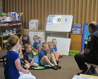 Neighbors | Alexis Bartolomucci.The students at Hitchcock Woods Daycare got a visit on July 19 from a Boardman patrolman to talk to them about safety and the life of a police officer.