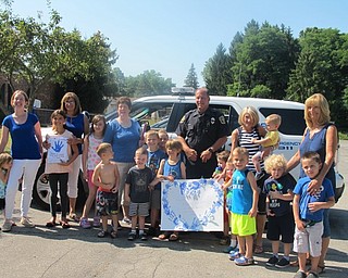 Neighbors | Alexis Bartolomucci.The students at Hitchcock Woods Daycare got a visit from Officer Mike from the Boardman police on July 19.