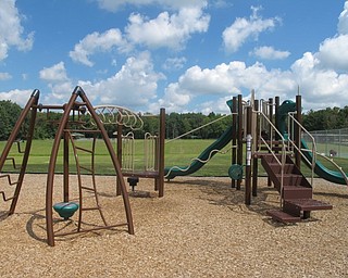 Neighbors | Alexis Bartolomucci.The Walter Terlecky playground at Austintown Township Park has equipment for children of all ages to play on.