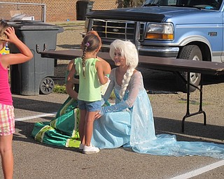 Neighbors | Alexis Bartolomucci.Children had the chance to meet Anna and Elsa from the movie "Frozen" during the Austintown Night Out event on Aug. 2 at Austintown Township Park.