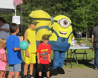 Neighbors | Alexis Bartolomucci.Minions were at the Austintown Night Out event on Aug. 2 at Austintown Township Park for children to meet and take pictures with.
