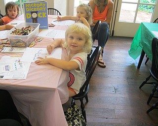 Neighbors | Alexis Bartolomucci.Molly worked on her craft after participating in the Baby Brilliant story time at the Poland library on Aug. 4.