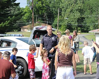 Neighbors | Abby Slanker.Canfield Local Schools Resource Officer Steve Garstka of the Canfield Police Department focused on teaching in-coming kindergarten students pedestrian safety and stranger danger during Canfield PTO’s Kindergarten Safety Day on Aug. 13.