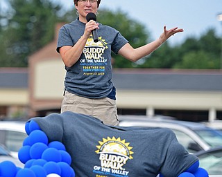 BOARDMAN, OHIO - AUGUST 13, 2016: Becky Switalski the National Director of the Buddy Walk speaks at the podium before the start of the Buddy Walk, Saturday morning at the Shops at Boardman Park. DAVID DERMER | THE VINDICATOR