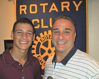 SPECIAL TO THE VINDICATOR
Austintown Rotary hosted Dante Colaluca, top picture, left, a senior at Boardman High School, at its August meeting. Colaluca discussed his experience with Buckeye Boys State in Columbus as a delegate for the State House of Representatives Education Committee and thanked the club for its financial support. With him is his father, Vince Colaluca, who is a past president of the club. The Rotary also hosted Rachel Flickinger, bottom picture, right, from the Regional Chamber of Commerce. Flickinger discussed programs implemented by the Chamber to benefit members, including discounts and networking opportunities. President Ed Kalaher, left, is shown with Flickinger following her presentation.
