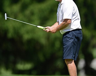 LIBERTY, OHIO - AUGUST 20, 2016: Rick Kurth of Boardman shows his frustration after his putt did not drop into the hole on the eighth hole Saturday afternoon at Youngstown Country Club. DAVID DERMER | THE VINDICATOR