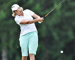Jeff Lange | The Vindicator  SUN, AUG 21, 2016 - Marilyn Woods watches her shot from the No. 16 fairway during the final round of the 2016 Farmers Bank Greatest Golfer of the Valley competition held at the Lake Club in Poland, Sunday, Aug. 21, 2016.
