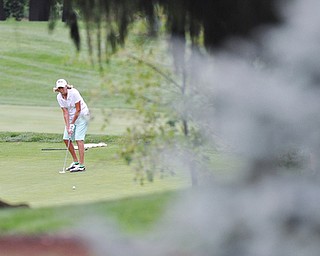 Jeff Lange | The Vindicator  SUN, AUG 21, 2016 - Marilyn Woods watches her putt to hole No. 17 during the final round of the 2016 Farmers Bank Greatest Golfer of the Valley competition held at the Lake Club in Poland, Sunday, Aug. 21, 2016.
