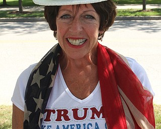 Nikos Frazier | The Vindicator..Debora Lieberman of Chagrin Falls poses for a photo outside the James A. Rhodes Arena at The University of Akron before Republican presidential candidate Donald Trump speaks at a campaign rally in Akron, Oh., Saturday, Aug. 20, 2016.
