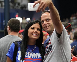 Nikos Frazier | The Vindicator..A couple takes a selfie before Republican presidential candidate Donald Trump speaks at a campaign rally in Akron, Oh., Saturday, Aug. 20, 2016.