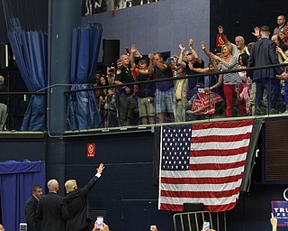 Nikos Frazier | The Vindicator..Republican presidential candidate Donald Trump waves goodbye to supporters after a campaign rally in Akron, Oh., Saturday, Aug. 20, 2016.