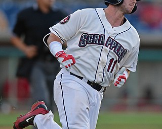 NILES, OHIO - AUGUST 22, 2016:Logan Ice #11 of the Scrappers runs to first after hitting a single in the second inning of Monday nights game at Eastwood Field. DAVID DERMER | THE VINDICATOR