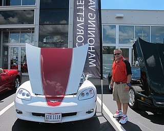 Neighbors | Alexis Bartolomucci.Vice President of the Corvette Club, Mike Sodomora, stood next to his Corvette at the annual Corvette Car show on Aug. 7 at Greenwood Chevrolet in Austintown.