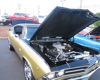 Neighbors | Alexis Bartolomucci.Cars that have won awards at other car shows were available to look at during the annual Corvette Car show at Austintown Greenwood Chevrolet on Aug. 7.