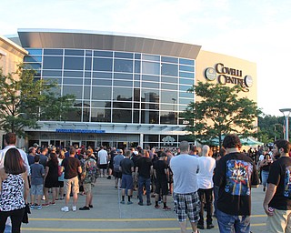 Nikos Frazier | The Vindicator..Concert goers line up outside the Covelli Center in downtown Youngstown before KISS took the stage Friday night.