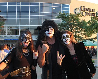 Nikos Frazier | The Vindicator..(From Left) Allison Atwood, Arn Atwood, and Traci Pickering of Newark pose for a photo outside the Covelli Center before the KISS concert Friday night.