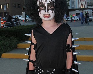 Nikos Frazier | The Vindicator..Bryce Schubert, 8, of Elyria,  poses for a photo outside the Covelli Center before the KISS concert Friday night.
