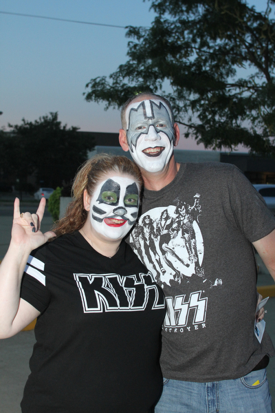 Nikos Frazier | The Vindicator..Meredith and Matt Nicodemus of Akron pose for a photo outside the Covelli Center before the KISS concert Friday night.