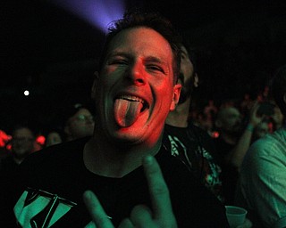 Nikos Frazier | The Vindicator..A fan poses for a photo during the KISS concert in the Covelli Center Friday night.