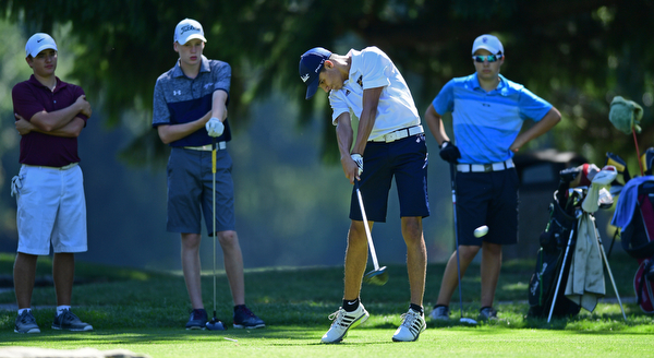 LIBERTY, OHIO - AUGUST 29, 2016: Jimmy Graham of JFK tees off on the fourteenth hole, while the other members of his group watch, Monday afternoon at the Youngstown Country Club during the Ursuline Invitational. DAVID DERMER | THE VINDICATOR