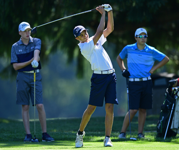 LIBERTY, OHIO - AUGUST 29, 2016: Jimmy Graham of JFK tees off on the fourteenth hole, while the other members of his group watch, Monday afternoon at the Youngstown Country Club during the Ursuline Invitational. DAVID DERMER | THE VINDICATOR