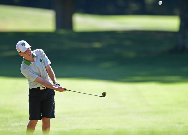 LIBERTY, OHIO - AUGUST 29, 2016: Danny Brooks of Ursuline follows through on his approach shot on the seventh hole Monday afternoon at the Youngstown Country Club during the Ursuline Invitational. DAVID DERMER | THE VINDICATOR