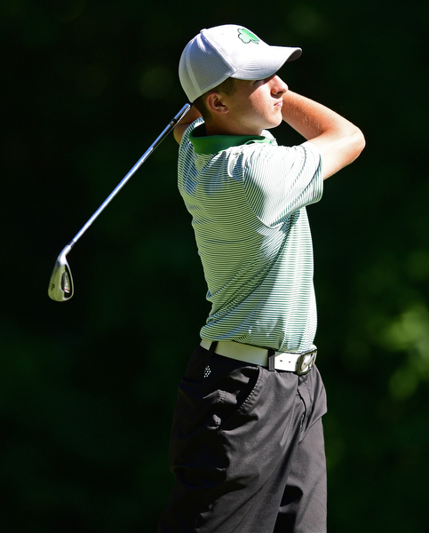 LIBERTY, OHIO - AUGUST 29, 2016: Michael Butch of Ursuline tees off on the ninth hole Monday afternoon at the Youngstown Country Club during the Ursuline Invitational. DAVID DERMER | THE VINDICATOR