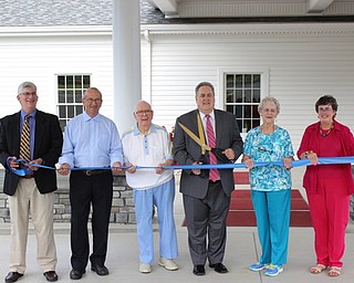 Neighbors | Abby Slanker.Jubilee Christian Fellowship celebrated the completion of its new state-of-the-art facility with a ribbon cutting ceremony on Aug. 9. Cutting the ribbon were, from left, Mark Kholos, builder Lloyd Martin, Herb Mincher, Pastor Jeffrey Mincher, Grace Mincher and Mindy Davies.