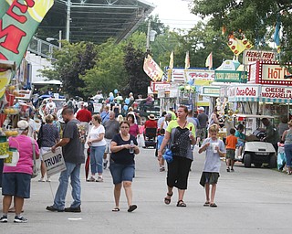        ROBERT K. YOSAY  | THE VINDICATOR...Fair time as people stoll the midway.. - -30-...