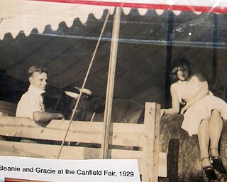        ROBERT K. YOSAY  | THE VINDICATOR.. a photo of Beanie and Grace ( howard) one of the first to show at the fair... she is sitting on a cow circa 1929...Honey Creek Farms, which marks its 100th year showing cattle at the Canfield Fair... - -30-...