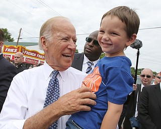        ROBERT K. YOSAY  | THE VINDICATOR..Joe Biden gives a  tickle to  Noah  Miner 4   - Noah was with his mom..Biden visits Canfield Fair... - -30-...