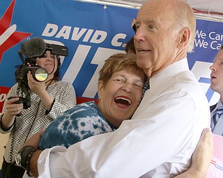        ROBERT K. YOSAY  | THE VINDICATOR..Joyce KalePesta shares the democratic hug...with Joe Biden..Biden visits Canfield Fair... - -30-...