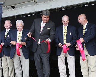        ROBERT K. YOSAY  | THE VINDICATOR..Ed Muransky  and fair board officals ....cut the ribbon..was the main speaker for the ribbon cutting officially opening the fair.... - -30-...