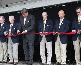        ROBERT K. YOSAY  | THE VINDICATOR..Ed Muransky  and fair board officals ....cut the ribbon..was the main speaker for the ribbon cutting officially opening the fair.... - -30-...