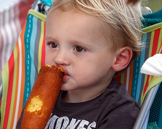        ROBERT K. YOSAY  | THE VINDICATOR..hot dogs .. and kids as Lachlan (OK)Ritchie of Salem 2  tries a corn dog  ( with him was his mom Kristen).. - -30-...