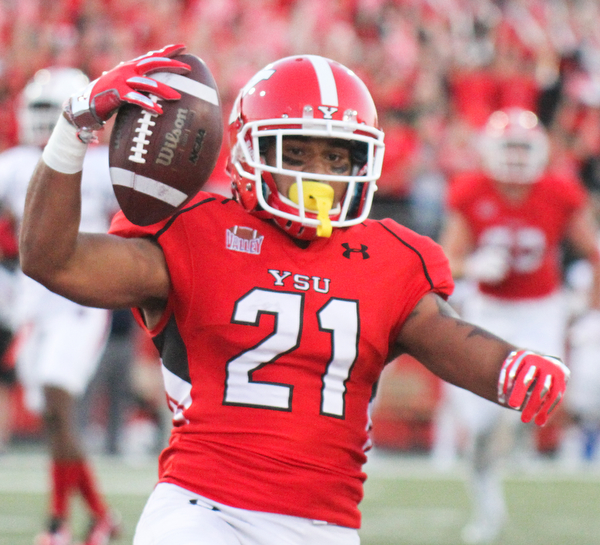 William D. Lewis/The Vindicator YSU Darien Townsend(21) reacts after scoring during 1rst qtr of Sept. 1, 2016 game with Duquesne.