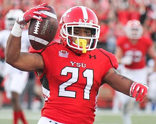 William D. Lewis/The Vindicator YSU Darien Townsend(21) reacts after scoring during 1rst qtr of Sept. 1, 2016 game with Duquesne.