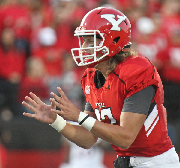 William D. Lewis/The Vindicator YSU QB Ricky Davis (12) during 1rst qtr of Sept. 1, 2016 game with Duquesne