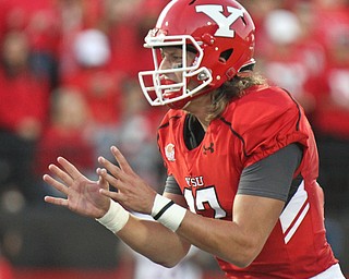 William D. Lewis/The Vindicator YSU QB Ricky Davis (12) during 1rst qtr of Sept. 1, 2016 game with Duquesne