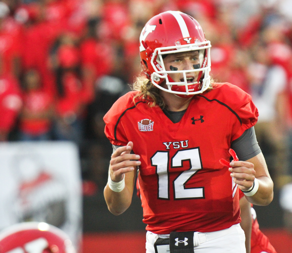 William D. Lewis/The Vindicator YSU QB Ricky Davis (12) during 1rst qtr of Sept. 1, 2016 game with Duquesne