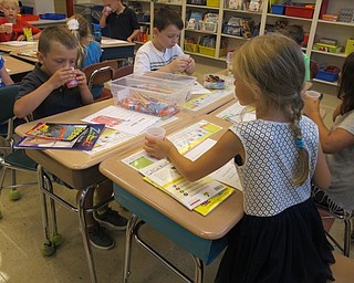 Neighbors | Alexis Bartolomucci.The students in Tina Bonarigo's first-grade class at Union Elementary School enjoyed the "jitter juice" they made during class on the first day of school on Aug. 22.