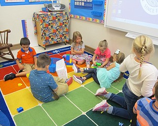 Neighbors | Alexis Bartolomucci.The kindergarten students in Maggie Schuster's class at Union Elementary built different items made out of blocks they shared on the first day of school on Aug. 22.