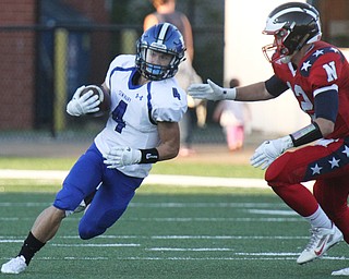 William D. Lewis The Vindicator  Poland's Mike Diaz(4) eludes Nile'Jordan Soda (12).