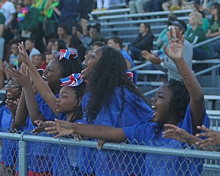The Youngstown East cheerleaders celebrate after the panthers force an interception during the second quarter of Friday nights matchup against Ursuline at Rayen Field in Youngstown. Dustin Livesay  |  The Vindicator  9/2/16  Rayen Stadium