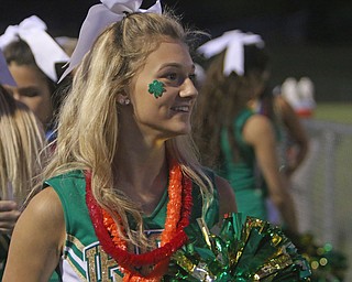 Ursuline High cheerleader Carly Sicilian supports the Irish as they make their way off the field at halftime during Friday nights matchup against Youngstown East at Rayen Stadium in Youngstown...Dustin Livesay  |  The Vindicator  9/2/16  Rayen Stadium
