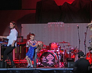 Members of "The Willis Clan" dance on center stage while performing at the Canfield Fair on Sunday night.  Dustin Livesay  |  The Vindicator  9/4/16  Canfield Fair