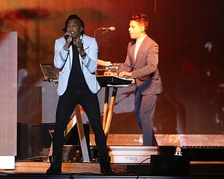 Newsboys lead singer Michael Tait (left) and pianist Jeff Frankenstein (right) perform at the Canfield Fair on Sunday night.  Dustin Livesay  |  The Vindicator  9/4/16  Canfield Fair