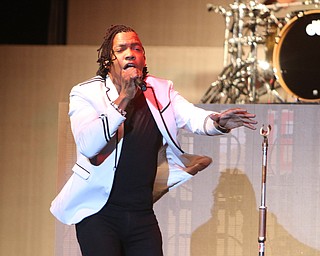 Michael Tait of the Newsboys directs sings while they perform at the Canfield Fair on Sunday night.  Dustin Livesay  |  The Vindicator  9/4/16  Canfield Fair
